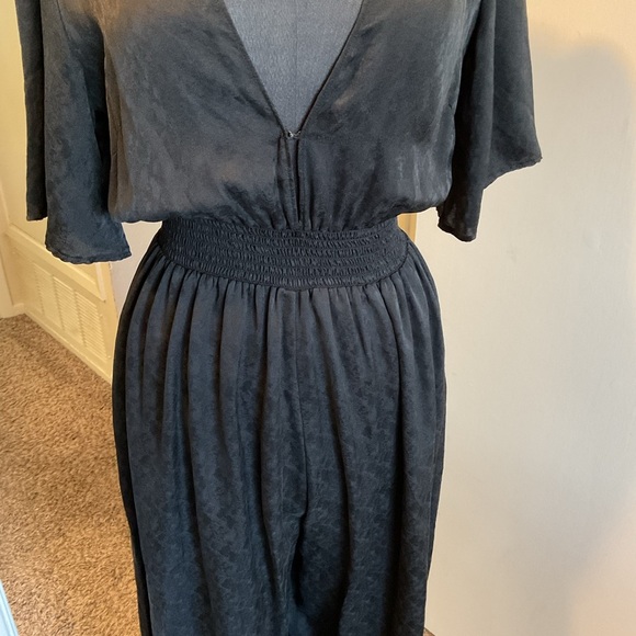 21. Reformation Black Jumpsuit with Sophisticated Wide-Leg Style Size 10 - Picture 10 of 13